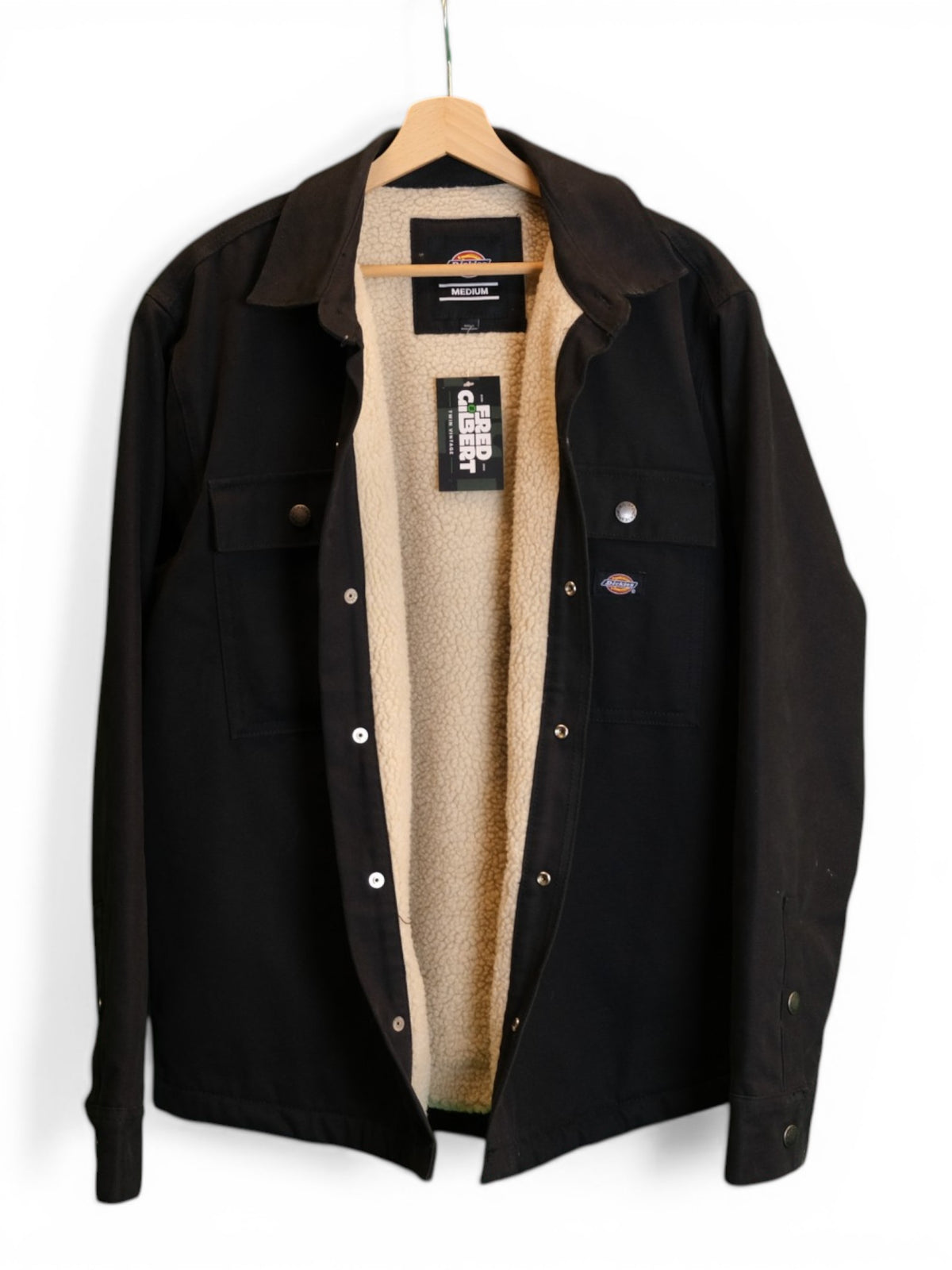 Unbuttoned Dickies jacket showing white sherpa lining